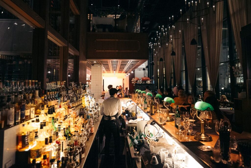 Acquafarina’s illuminated bar and wine display in downtown Vancouver
